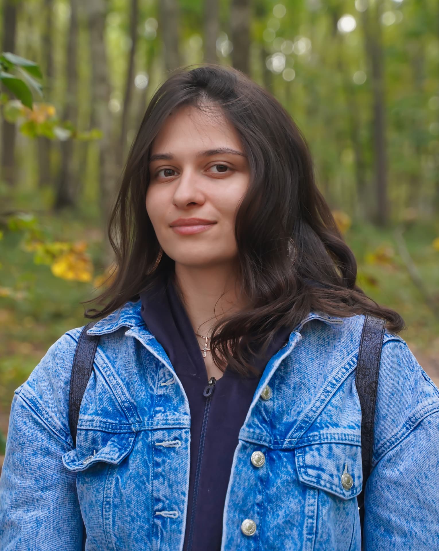 Diana Bastrakova, Co-Founder and Lead Web Designer, working in a notebook.